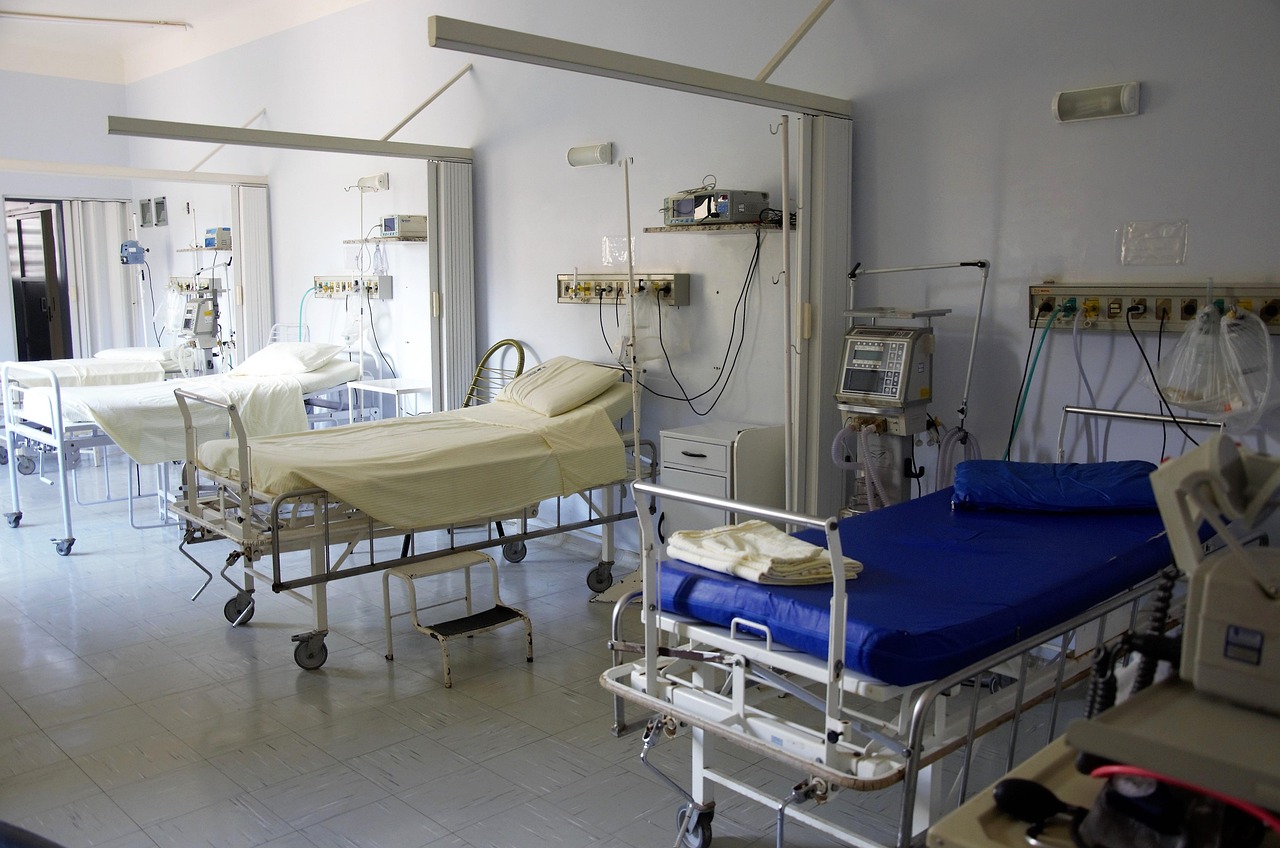 Modern healthcare clinic with patient treatment rooms, hospital beds, monitoring equipment, and diagnostic technology representing chiropractic practice financing, physician business loans, ultrasound equipment financing, medical practice financing, and medical clinic financing used to establish, expand, and modernize healthcare facilities.